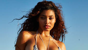 Danielle Herrington was photographed by James Macari in Costa Rica. Swimsuit by beijobaby.