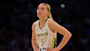 Sep 7, 2025; Los Angeles, California, USA;  Dallas Wings guard Paige Bueckers (5) looks on during the first half against the Los Angeles Sparks at Crypto.com Arena. Mandatory Credit: Jayne Kamin-Oncea-Imagn Images