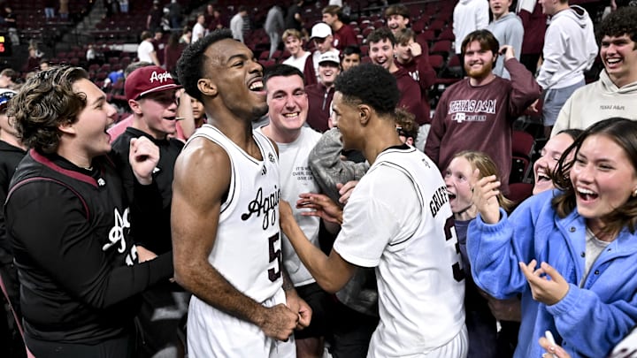 Jan 10, 2026; College Station, Texas, USA; Texas A&M Aggies guard Jacari Lane (5) and guard Rylan Griffen (3) celebrate after the game against the Oklahoma Sooners at Reed Arena. Mandatory Credit: Maria Lysaker-Imagn Images 