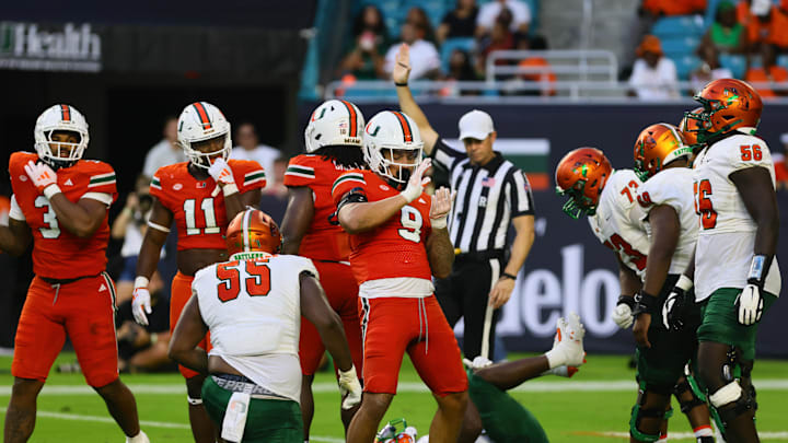 Sep 7, 2024; Miami Gardens, Florida, USA; Miami Hurricanes defensive lineman Tyler Baron (9) celebrates after sack against Florida A&M Rattlers quarterback Daniel Richardson (not pictured) during the second quarter at Hard Rock Stadium. Mandatory Credit: Sam Navarro-Imagn Images