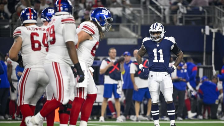 Nov 24, 2022; Arlington, Texas, USA; Dallas Cowboys linebacker Micah Parsons (11) looks at the New York Giants offensive line during the game between the Dallas Cowboys and the New York Giants at AT&T Stadium.  