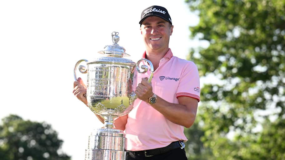 Justin Thomas poses with the Wanamaker trophy after winning the PGA Championship at Southern Hills Country Club.