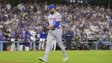 Oct 20, 2024; Los Angeles, California, USA; New York Mets pitcher Sean Manaea (59) walks to the dugout after being relieved in the third inning against the Los Angeles Dodgers during game six of the NLCS for the 2024 MLB playoffs at Dodger Stadium. Mandatory Credit: Jayne Kamin-Oncea-Imagn Images