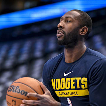 Nov 18, 2022; Dallas, Texas, USA; Denver Nuggets guard Davon Reed (9) warms up before the game between the Dallas Mavericks and the Denver Nuggets at the American Airlines Center. Mandatory Credit: Jerome Miron-Imagn Images