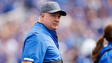 Sep 6, 2025; Lexington, Kentucky, USA; Kentucky Wildcats head coach Mark Stoops walks onto the field before the game against the Mississippi Rebels at Kroger Field. Mandatory Credit: Jordan Prather-Imagn Images
