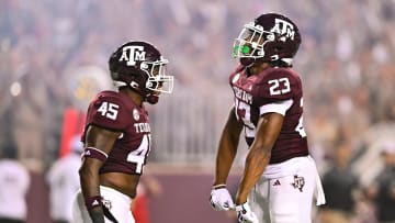 Sep 2, 2023; College Station, Texas, USA; Texas A&M Aggies linebacker Chantz Johnson (23) and linebacker Edgerrin Cooper (45) react to a play during the third quarter against New Mexico Lobos at Kyle Field. Mandatory Credit: Maria Lysaker-USA TODAY Sports