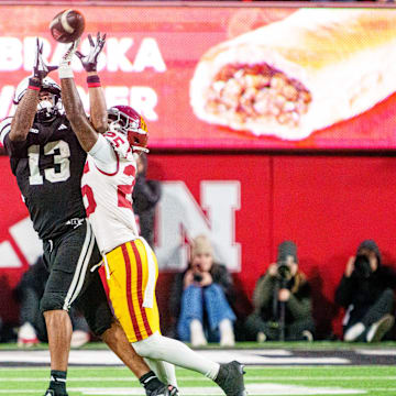 Nov 1, 2025; Lincoln, Nebraska, USA; Southern California Trojans cornerback Marcelles Williams (25) breaks up a pass to Nebraska Cornhuskers wide receiver Nyziah Hunter (13) during the fourth quarter at Memorial Stadium. 