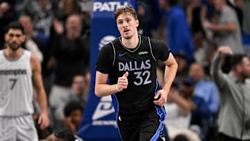 Nov 22, 2025; Dallas, Texas, USA; Dallas Mavericks forward Cooper Flagg (32) runs back up the court after scoring against the Memphis Grizzlies during the second half at the American Airlines Center. Mandatory Credit: Jerome Miron-Imagn Images