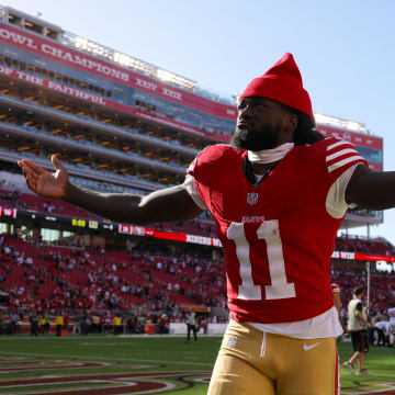 Oct 1, 2023; Santa Clara, California, USA; San Francisco 49ers wide receiver Brandon Aiyuk (11) celebrates after the game against the Arizona Cardinals at Levi's Stadium. Mandatory Credit: Sergio Estrada-USA TODAY Sports