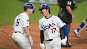 Los Angeles Dodgers two-way player Shohei Ohtani (17) celebrates scoring in the fifth inning against the Toronto Blue Jays during game three of the 2025 MLB World Series at Dodger Stadium on Monday.