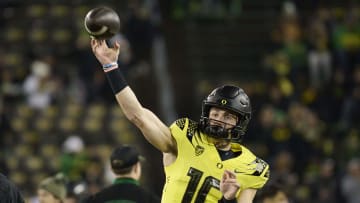 Nov 11, 2023; Eugene, Oregon, USA; Oregon Ducks quarterback Bo Nix (10) warms up before a game against the USC Trojans at Autzen Stadium. Mandatory Credit: Troy Wayrynen-USA TODAY Sports