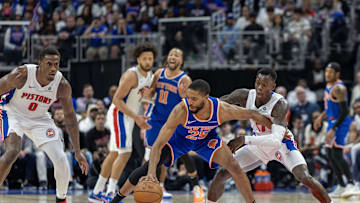 New York Knicks forward Mikal Bridges controls the ball in front of Detroit Pistons guard Dennis Schroder. Mandatory Credit: David Reginek-Imagn Images 