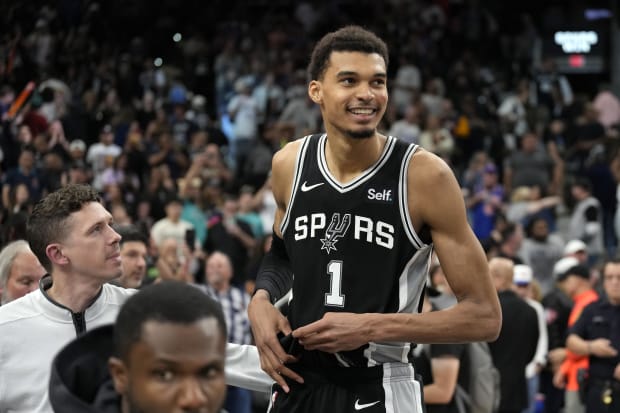 San Antonio Spurs forwards Victor Wembanyama reacts after an overtime victory over the New York Knicks at Frost Bank Center. 