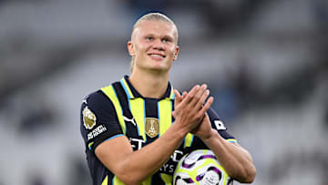 Erling Haaland collecting his eighth Premier League match ball after the game against West Ham United 