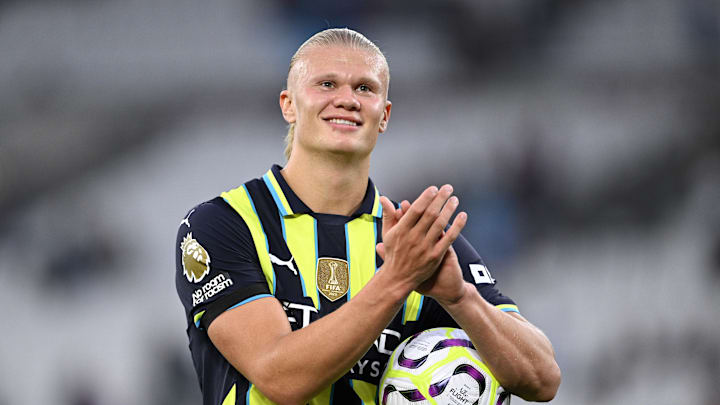 Erling Haaland collecting his eighth Premier League match ball after the game against West Ham United 