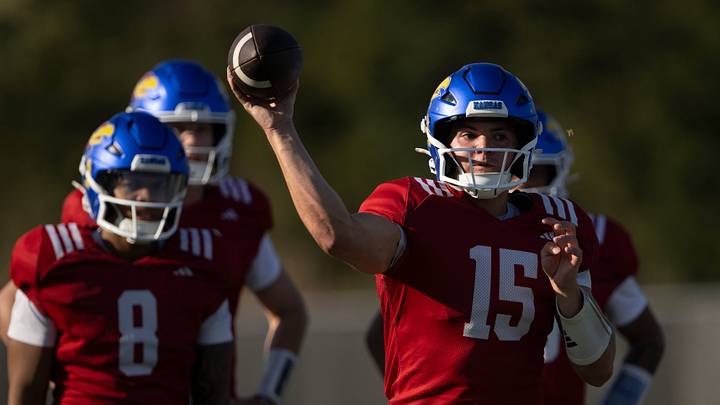 Kansas redshirt junior quarterback Cole Ballard (15) passes the ball during spring football practice Thursday, Mar. 26, 2026 in Lawrence, Kansas.