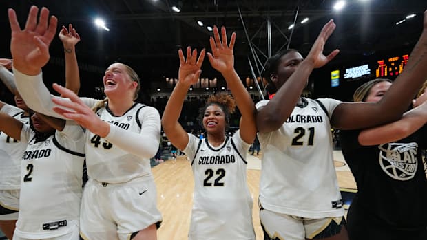 Feb 9, 2024; Boulder, Colorado, USA; Colorado Buffaloes guard Tameiya Sadler (2) and forward Charlotte Whittaker (45) and gua