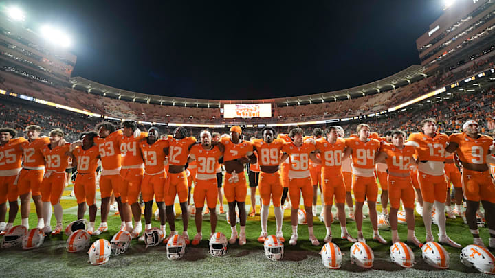 Tennessee players listen to the Tennessee Waltz after a game between Tennessee and Kent State at Neyland Stadium, in Knoxville, Tenn., Saturday, Sept. 14, 2024. Tennessee defeated Ken State 71-0.