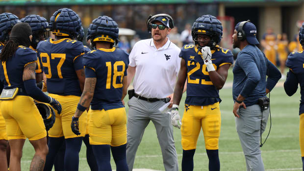 West Virginia University outside linebacker coach Victor Cabral.