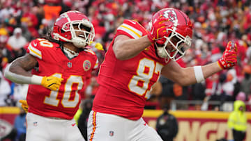 Jan 18, 2025; Kansas City, Missouri, USA; Kansas City Chiefs tight end Travis Kelce (87) celebrates with running back Isiah Pacheco (10) after making a long pass reception against the Houston Texans during the second quarter of a 2025 AFC divisional round game at GEHA Field at Arrowhead Stadium.
