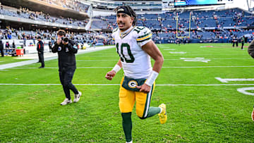 Nov 17, 2024; Chicago, Illinois, USA; Green Bay Packers quarterback Jordan Love (10) runs off the field after the game against the Chicago Bears at Soldier Field. Mandatory Credit: Daniel Bartel-Imagn Images