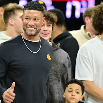 Feb 19, 2025; South Bend, Indiana, USA; Notre Dame head football coach Marcus Freeman and team are honored in the first half of the game between the Notre Dame Fighting Irish and the SMU Mustangs at the Purcell Pavilion.