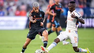 New York City midfielder Santiago Rodriguez (10) and FC Cincinnati midfielder Obinna Nwobodo (5)  