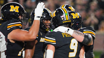 Missouri Tigers quarterback Beau Pribula (9) celebrates after running in for a two point conversion, in a game against the South Carolina Gamecocks this season.