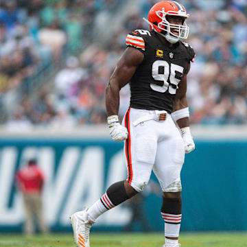 Sep 15, 2024; Jacksonville, Florida, USA; Cleveland Browns defensive end Myles Garrett (95) celebrates a stop against the Jacksonville Jaguars in the third quarter at EverBank Stadium. Mandatory Credit: Jeremy Reper-Imagn Images