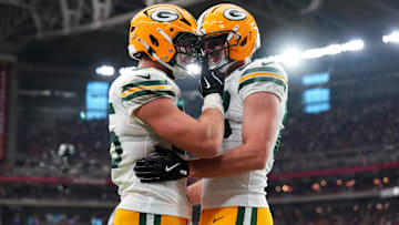 Oct 19, 2025; Glendale, Arizona, USA; Green Bay Packers tight end Tucker Kraft (85) celebrates a touchdown against the Arizona Cardinals with Green Bay Packers tight end Luke Musgrave (88) during the second half against the Arizona Cardinals at State Farm Stadium.