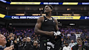 Nov 9, 2025; Sacramento, California, USA; Minnesota Timberwolves guard Anthony Edwards (5) gives his jersey to a young fan during the fourth quarter against the Sacramento Kings at Golden 1 Center. Mandatory Credit: Justine Willard-Imagn Images