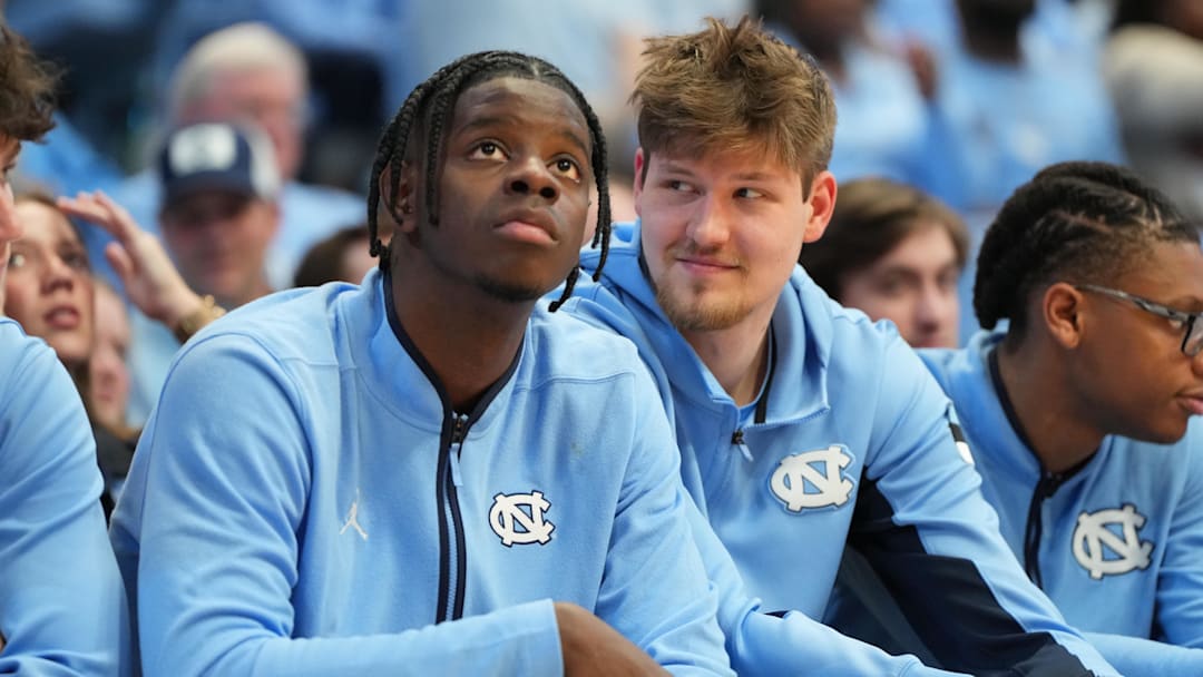 North Carolina Tar Heels forward Caleb Wilson (8) and center Henri Veesaar (13) North Carolina Tar Heels forward Caleb Wilson (8) and center Henri Veesaar (13)