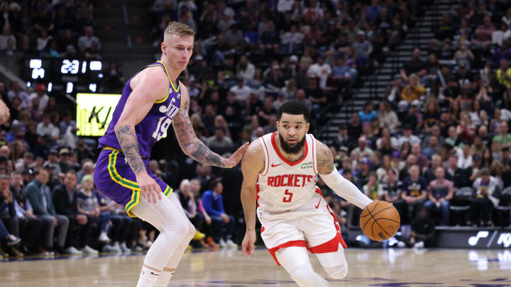 Apr 11, 2024; Salt Lake City, Utah, USA; Houston Rockets guard Fred VanVleet (5) dribbles past Utah Jazz forward Luka Samanic (19) during the third quarter at Delta Center. Mandatory Credit: Rob Gray-USA TODAY Sports