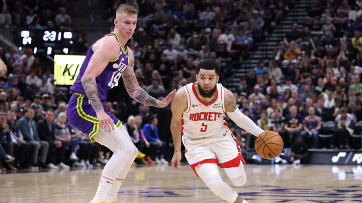 Apr 11, 2024; Salt Lake City, Utah, USA; Houston Rockets guard Fred VanVleet (5) dribbles past Utah Jazz forward Luka Samanic (19) during the third quarter at Delta Center. Mandatory Credit: Rob Gray-USA TODAY Sports