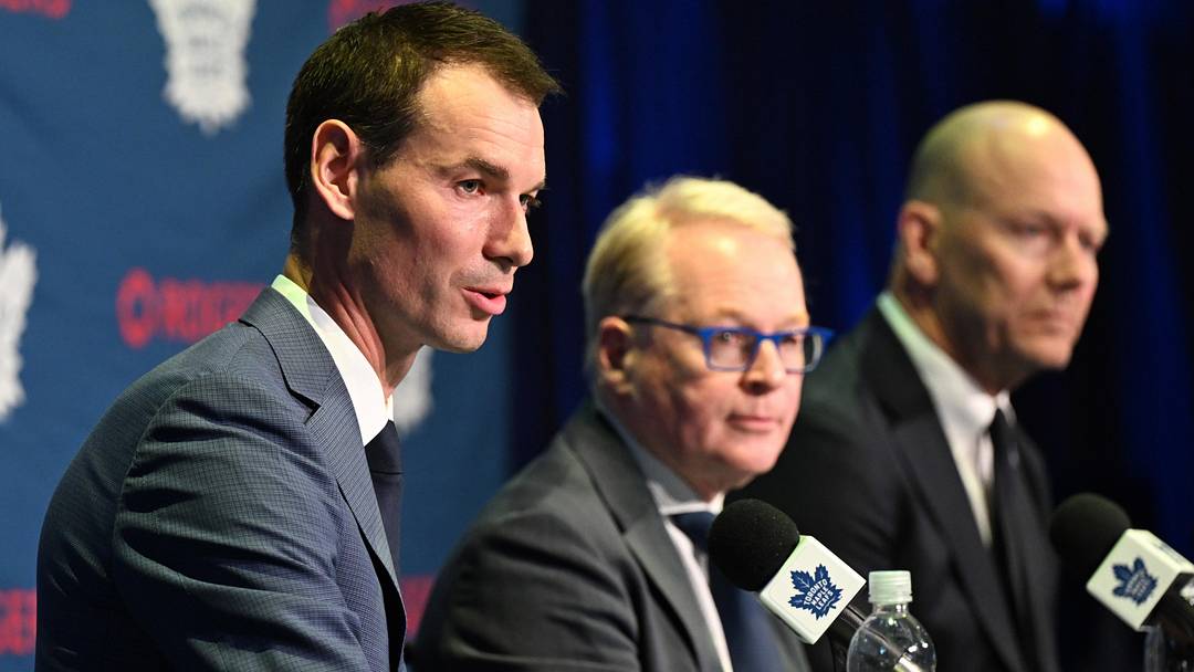 May 4, 2026; Toronto, Ontario, CANADA;  Toronto Maple Leafs general manager John Chayka answers media questions beside Maple Leafs Sports and Entertainment CEO Keith Pelley and senior executive advisor Mats Sundin during an introductory news conference at Real Sports Bar and Grill. Mandatory Credit: Dan Hamilton-Imagn Images