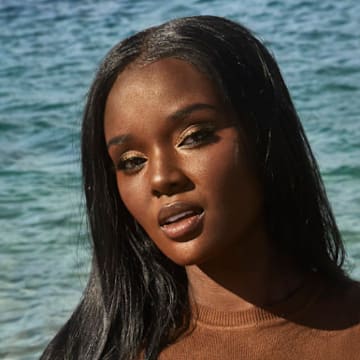 Duckie Thot was photographed by James Macari in Montenegro. Top by Zara.