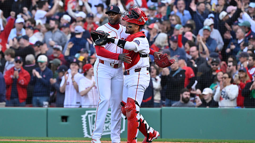 Apr 3, 2026; Boston, Massachusetts, USA; Boston Red Sox relief pitcher Aroldis Chapman (44) and catcher Carlos Narvaez (75) celebrate beating the San Diego Padres  at Fenway Park. Mandatory Credit: Eric Canha-Imagn Images