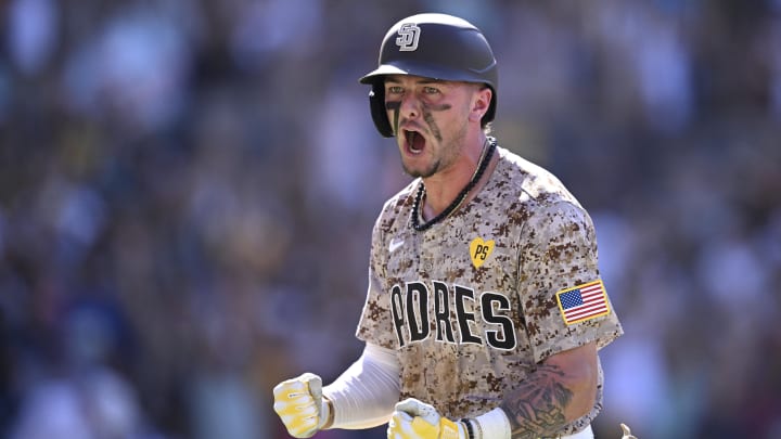 San Diego Padres center fielder Jackson Merrill celebrates on the field after hitting a walk-off home run against the New York Mets.