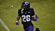 Nov 29, 2025; Fort Worth, Texas, USA; TCU Horned Frogs running back Jeremy Payne (26) runs with the ball against the Cincinnati Bearcats during the second half at Amon G. Carter Stadium. Mandatory Credit: Jerome Miron-Imagn Images