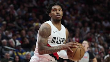 Oct 14, 2025; Portland, Oregon, USA; Portland Trail Blazers guard Caleb Love (2) holds the ball during the second half against the Golden State Warriors at Moda Center. Mandatory Credit: Troy Wayrynen-Imagn Images