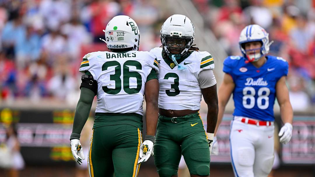 Sep 6, 2025; Dallas, Texas, USA; Baylor Bears linebacker Travion Barnes (36) and safety Devyn Bobby (3) look on during the game between the SMU Mustangs and the Baylor Bears at Gerald J. Ford Stadium. Mandatory Credit: Jerome Miron-Imagn Images Sep 6, 2025; Dallas, Texas, USA; Baylor Bears linebacker Travion Barnes (36) and safety Devyn Bobby (3) look on during the game between the SMU Mustangs and the Baylor Bears at Gerald J. Ford Stadium. Mandatory Credit: Jerome Miron-Imagn Images