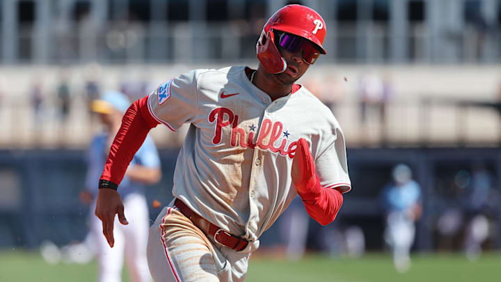 Feb 25, 2025; Port Charlotte, Florida, USA; Philadelphia Phillies outfielder Justin Crawford (80) runs home to score against the Tampa Bay Rays during the fourth inning at Charlotte Sports Park. Feb 25, 2025; Port Charlotte, Florida, USA; Philadelphia Phillies outfielder Justin Crawford (80) runs home to score against the Tampa Bay Rays during the fourth inning at Charlotte Sports Park.
