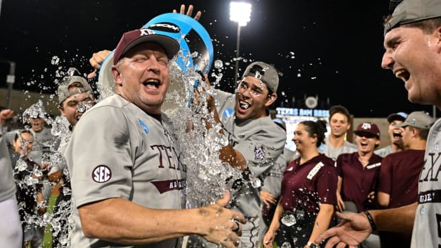 Jun 9, 2024; College Station, TX, USA; Texas A&M head coach Jim Schlossnagle celebrates after sweeping Oregon in the Bryan-College Station Super Regional series at Olsen Field, Blue Bell Park Mandatory Credit: Maria Lysaker-USA TODAY Sports