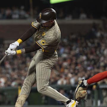 San Diego Padres outfielder Jackson Merrill (3) hits a double during the fourth inning against the San Francisco Giants at Oracle Park on Sept 13.