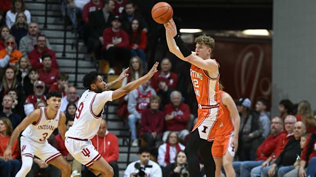 Jan 14, 2025; Bloomington, Indiana, USA; Illinois Fighting Illini guard Kasparas Jakucionis (32) passes the ball against IU