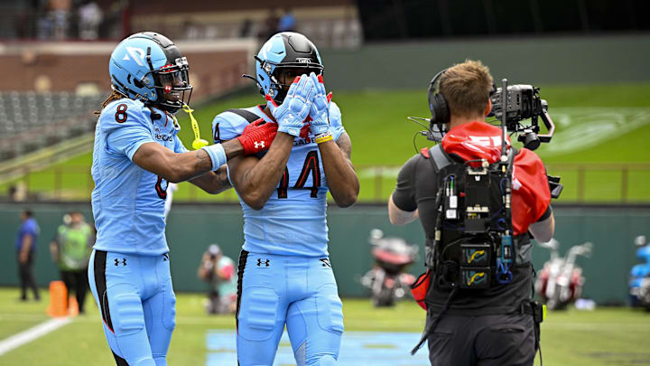 Mar 30, 2024; Arlington, TX, USA; Arlington Renegades defensive back Delonte Hood (14) and wide receiver Isaiah Winstead (14) celebrate after Winstead catches a pass for a touchdown against the Birmingham Stallions during the first half at Choctaw Stadium. Mandatory Credit: Jerome Miron-Imagn Images Mar 30, 2024; Arlington, TX, USA; Arlington Renegades defensive back Delonte Hood (14) and wide receiver Isaiah Winstead (14) celebrate after Winstead catches a pass for a touchdown against the Birmingham Stallions during the first half at Choctaw Stadium. Mandatory Credit: Jerome Miron-Imagn Images