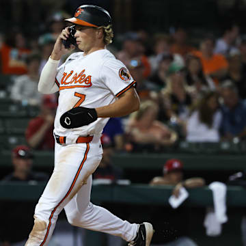 Mar 14, 2025; Sarasota, Florida, USA; Baltimore Orioles second base Jackson Holliday (7) scores a run during the fifth inning against the Minnesota Twins  at Ed Smith Stadium. 