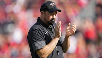 Oct 18, 2025; Madison, Wisconsin, USA;  Ohio State Buckeyes head coach Ryan Day during warmups prior to the game against the Wisconsin Badgers at Camp Randall Stadium.