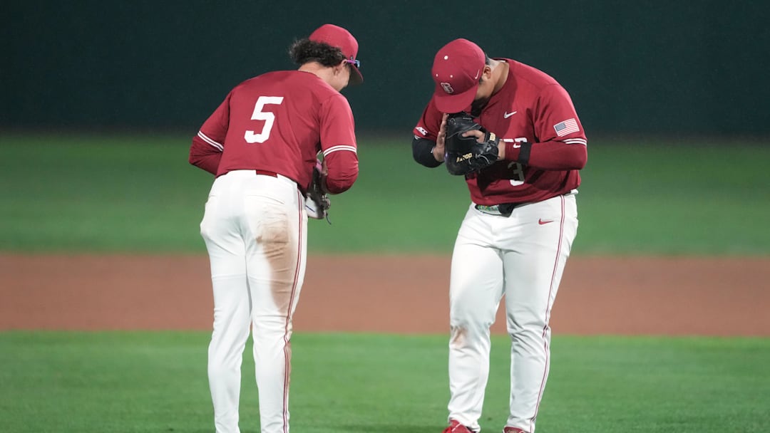 Mar 1, 2025; Stanford, CA, USA; Stanford Cardinal first baseman Rintaro Sasaki (right) and third baseman Trevor Haskins (5) celebrate after defeating the Xavier Musketeers at Sunken Diamond. Mandatory Credit: Darren Yamashita-Imagn Images