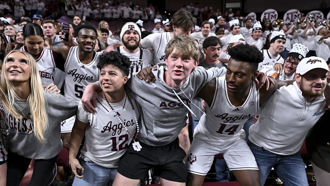 Jan 21, 2026; College Station, Texas, USA; Texas A&M Aggies guard Jacari Lane (5), forward Chris McDermott (14) and forward Zach Clemence (7) celebrate with the students after the win over Mississippi State Bulldogs at Reed Arena. Mandatory Credit: Maria Lysaker-Imagn Images 